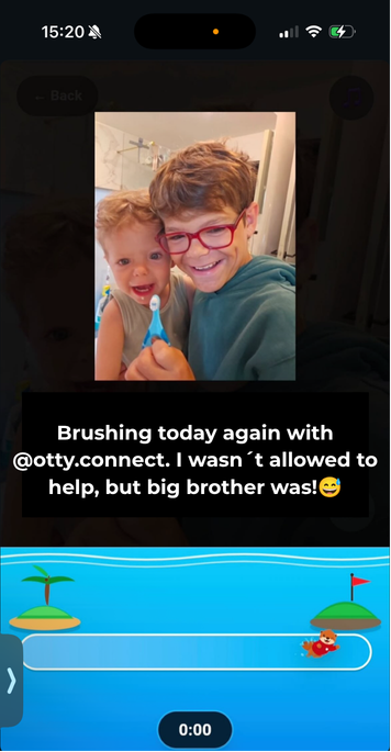 Big brother brushing with his little brother and Otty